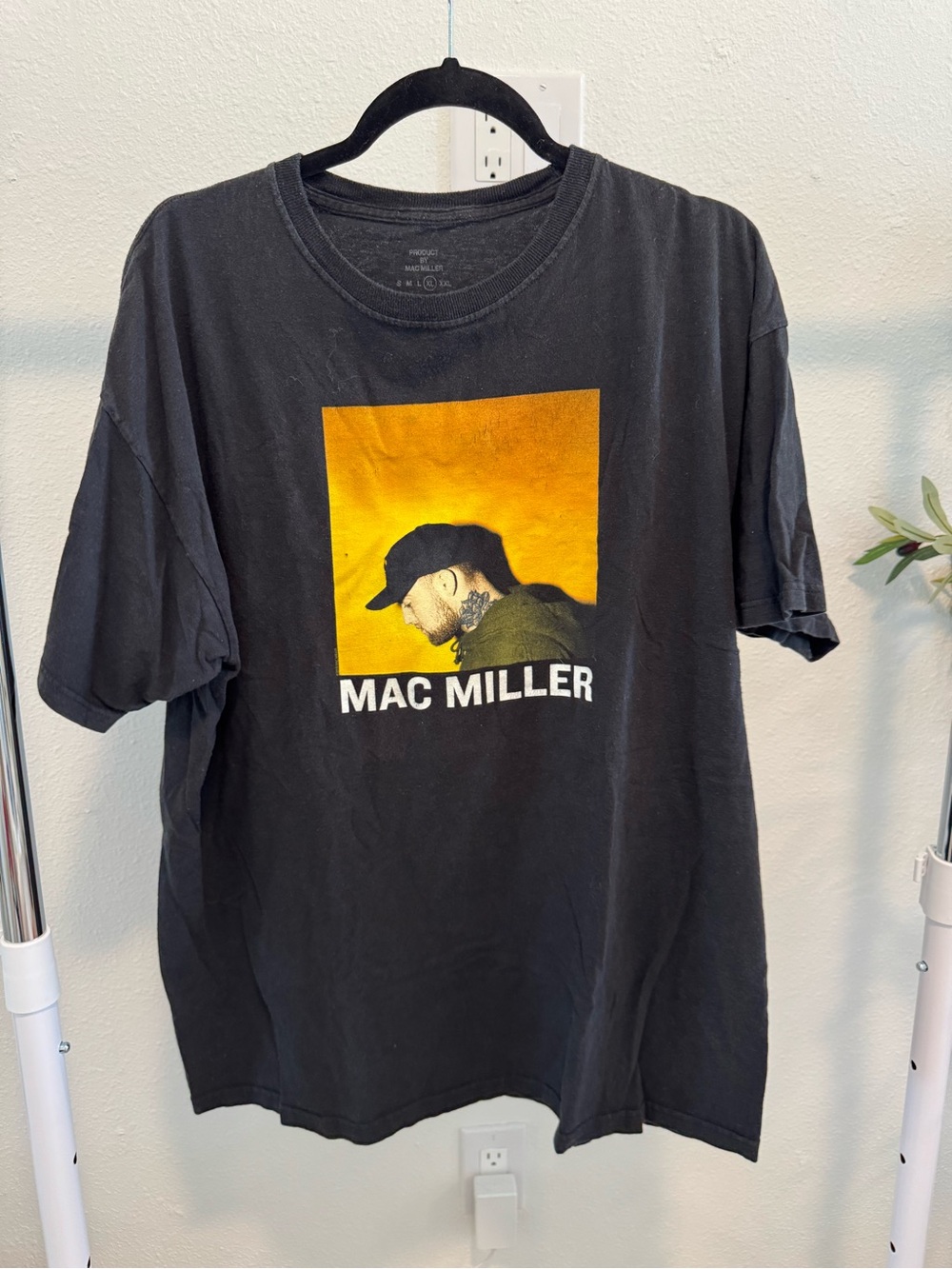 Black Short-Sleeve Graphic Tee with Yellow Print